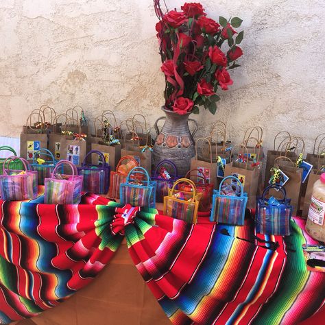 Fiesta goodie bag station Mexican Theme Party Decorations For 15, Mexican Decorations For Quinceanera, Mexican Theme 3rd Birthday Party, Mexican Birthday Decorations, Mexican Party Theme Decorations, Mexican Favors Ideas, Mexican Party Centerpiece, Charro 3rd Birthday Party, Mexican Theme Bautizo