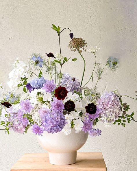 In love with the cut flower garden, and its treasures this time of the year. Blues, lavender, whites and browns in this garden flower arrangement. Chic and different 🤍 #gardenflowers #seasonalflowers #localflowers #flowerarrangement #weddingflorist #eventflorist Blue Purple Flowers Arrangement, Purple And Green Floral Arrangements, Purple Flower Arrangements, Small Flower Arrangements, Green Event, Purple Vase, Scotland Wedding, Blue And Purple Flowers, Cut Flower Garden