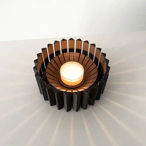 Infuse your home with modern charm and sophistication. The Bako Tealight Holder's dynamic design creates striking visual effects, casting intriguing patterns of light and shadow. Made with high-quality materials, it combines durability with a sleek, contemporary look, perfect for both casual and formal settings. Create a cozy atmosphere for intimate gatherings or add elegance to your everyday décor. Light up your world with the Bako Tealight Holder! 🎁 Tea Light Candle Included🎁 Features: -... Modern Candle Holder, Modern Candle, Modern Candle Holders, Color Switch, Modern Candles, Tealight Candle Holder, Tealight Candle, Tealight Candle Holders, Tea Light Candles