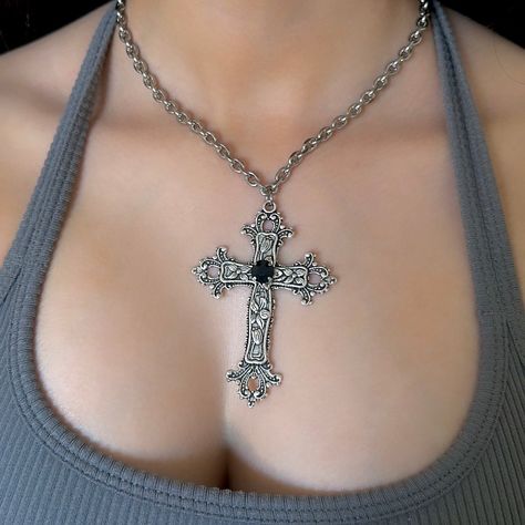 This Gothic Cross Necklace includes a Silver Big Cross Pendant making it a perfect vintage grunge jewelry gift for her. Featuring a statement black rhinestone on the center of the cross pendant, it blends religious jewelry elements with bold, edgy style. 𝐃𝐄𝐓𝐀𝐈𝐋𝐒:  ⭐️ Necklace lengths available: 14" 16" 18"  ⭐️ Big cross pendant size is 3" ⭐️ The large silver cross pendant is silver plated over metal. The chain necklace is made up of a high quality stainless steel, safe for those with sens Chunky Cross Necklace Outfit, Cross Necklace Aesthetic, Big Cross Necklace, Big Silver Necklace, Big Necklaces, Gothic Cross Necklace, Big Cross, Grunge Jewelry, Pendant Making