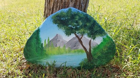 Mountain and Lake scene, painted rock Rock Painting Lake Scene, Painted Rock Mountain Scene, Mountain Rocks, Rock Painting Flowers, Mountain And Lake, Lake Scene, Paint Rocks, Painted Rocks Kids, Painted Rocks Diy