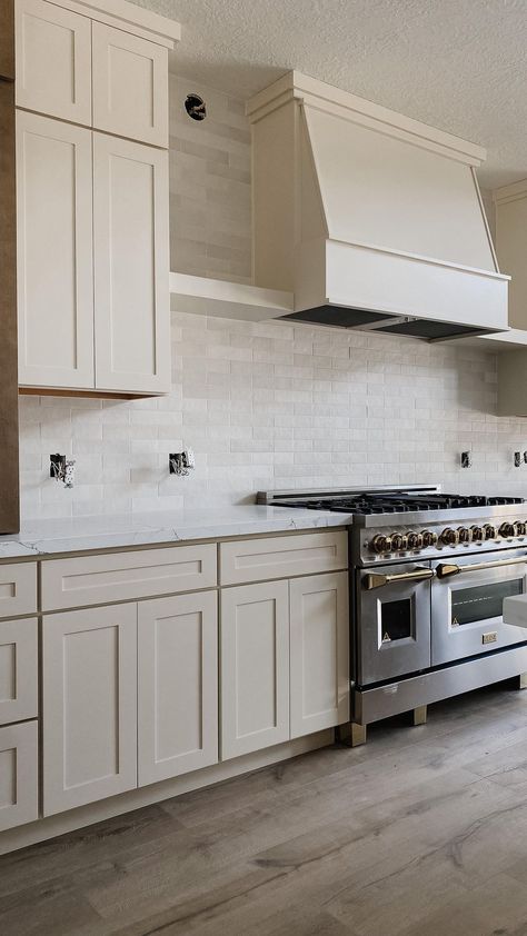 ourdailytribe on Instagram: Progress at the spec house build and I’m smitten with how it’s all coming together 🙌 . . . Tile- @bedrosianstile Makoto shoji white… Kitchen Cabinet Color Ideas With White Tile Floors, Sw Creamy, Greige Kitchen, Kitchen Hood Design, 2022 Kitchen, Off White Cabinets, Spec House, Kitchen Appliances Design, Off White Kitchens