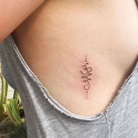 Stick and Poke 101: What Do Unalome Tattoos Mean? Spiritual Small Tattoos For Women, Chakra Unalome Tattoo, Unalome Minimalist Tattoo, Unalome Symbols And Meanings, Unalome Tattoo Meaning, Thai Tattoo Meaning, Unalome Tattoos, Om Tattoo Design, Yoga Tattoos