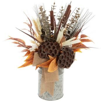 Full Dimensions (Varies Upon Shaping): 18.75" H x 14.75" W x 10.63" D Pot Dimensions: 7.75" H x 5" W x 5" D Plant Type: Lotus, Cattail, Eucalyptus & Wheat Material: Fabric, Metal, Plastic & Burlap Color: Brown, Burnt Orange, Silver & Beige Care & Safety: Indoor Use Only Quantity: 1 Celebrate the beautiful fall season with the help of this Cattail & Lotus Pod Arrangement In Metal Pitcher. This quaint faux floral display features an arrangement of cattails, lotus pods, and eucalyptus leaves. Betwe Metal Pitcher, Bow Display, Thanksgiving Floral, Lotus Pods, Fall Flower Arrangements, Orange Leaves, Faux Floral Arrangement, Autumn Display, Fall Arrangements