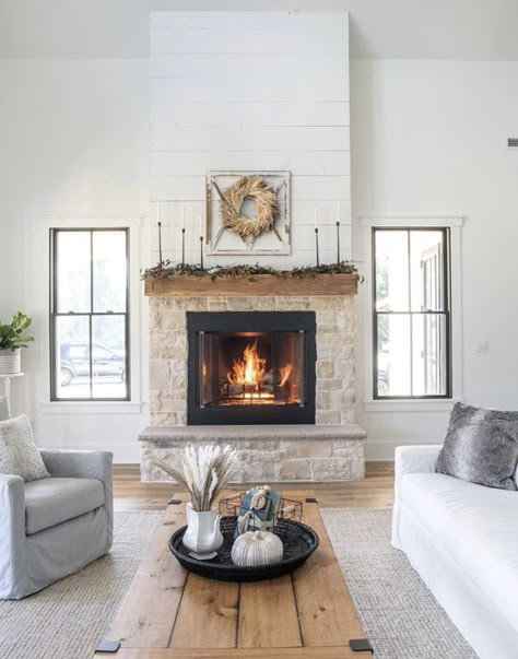 Fireplace With Tall Windows On Each Side, Gable End Fireplace, Extending Fireplace To Ceiling, California Casual Fireplace, Stone Front Fireplace, Fireplace Two Story Living Room, Low Ceiling Fireplace, Stone Fireplace With Shiplap, Fireplace Windows On Each Side