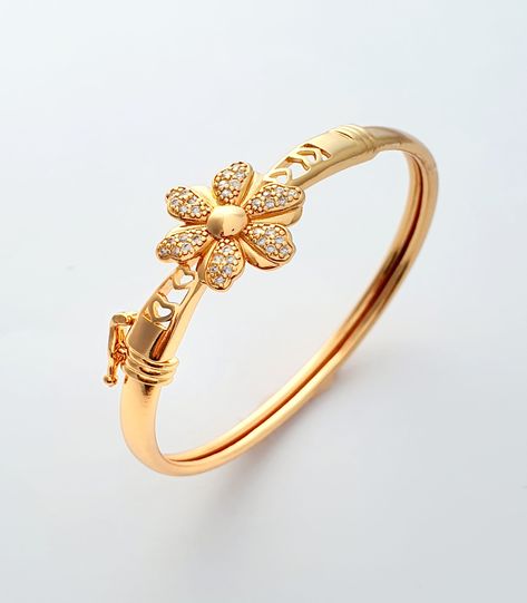 ✦ Product Details: - Type : Bangle, Bracelet, Kada - Plating : 14k Gold Plated - Sizes : 2.6 - Base Metal : Brass - Color : Gold - Closure : Hook - Occasion : Western Casual - Stone Type : American Diamond /Cubic zirconia Gold Kada For Women, Kada For Women, Diy Necklace Display, Gold Kada, Jewelry Royal, Western Casual, Gold Bangles For Women, Bracelets Collection, Bangles Design