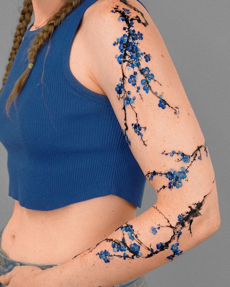 𝗘.𝗻𝗮𝗹 on Instagram: “Brushstroke Branch Sleeve with Blue Flower 🌸 The guest was dressed in all blue, from her clothes to her shoes 💙 @e.nal.tattoo @vismstudio” Tato Naruto, Blue Flower Tattoos, Blue Ink Tattoos, Tato Maori, Tato Minimal, 16 Tattoo, Blue Rose Tattoos, Vine Tattoos, Blue Tattoo