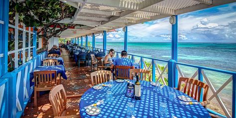 The 12 Best Waterfront Restaurants in Grand Cayman | Explore Cayman Georgetown Grand Cayman, Asian Cafe, Cayman Brac, Grand Cayman Island, Cayman Island, Waterfront Restaurant, Grand Cayman, Budget Hotel, Fabric Baskets