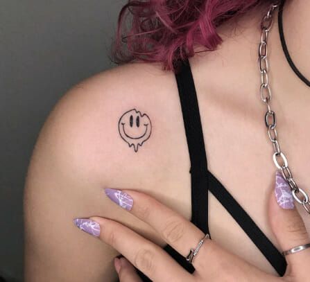 Drippy Smiley Shoulder Tattoos For Women Melty Smiley Face Tattoo, Smiley Hand Tattoo, Semi-colon Smiley Face Tattoo, Dripping Smiley Face Tattoo, Droopy Smiley Face Tattoo, Smiley Face Flower Tattoo, Happy Tattoos For Women, Drippy Smiley Face Tattoo, Melting Face Tattoo