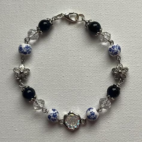 Selling on my instagram: norigazing #handmade #jewelry #bracelet #blue #navy #flower #flowercharm #beads #clear #white #clear #aesthetic #smallbuisness #elegant Clear Aesthetic, Bracelet Blue, Clear White, Jewelry Bracelet, Blue Bracelet, Flower Charm, Message Me, Handmade Jewelry, Charms