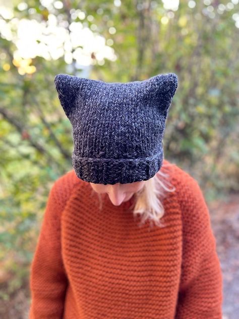 Knitted cat hat - Free knitting pattern. The knitted cat hat is a perfect project for beginners. The pattern is easy to follow and works up quickly with super bulky yarn. Perfect for cat lovers, Halloween enthusiasts, or anyone looking to infuse a dash of personality into their style, our knitted cat hat is not just an accessory; it's a statement piece that sparks joy and conversation wherever you go. Kitten Beanie Crochet, Cat Hat Knit Pattern, Knit Bunny Ears Free Pattern, Cat Ears Hat Knitting Pattern, Cat Ear Hat Knitting Pattern Free, Knitted Hat For Beginners, Fall Hat Knitting Pattern, Easy Knit Hat From Rectangle, Knitted Cat Beanie Pattern