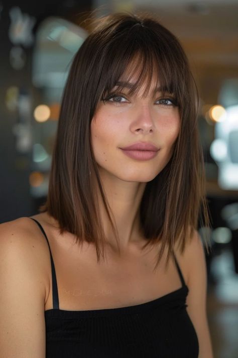 Dreaming of that effortlessly chic French girl style? Look no further than the long bob with bangs. This timeless cut exudes sophistication and playfulness, framing your face perfectly while adding a touch of Parisian flair Long Bangs With Bob, Fringe Long Bob Haircut, Lib With Bangs, Fashion Haircut, Bangs With Mid Length Hair, Long Bob With Bangs Straight Hair, Bangs With Long Bob, Long With Bangs, Fringe And Bob