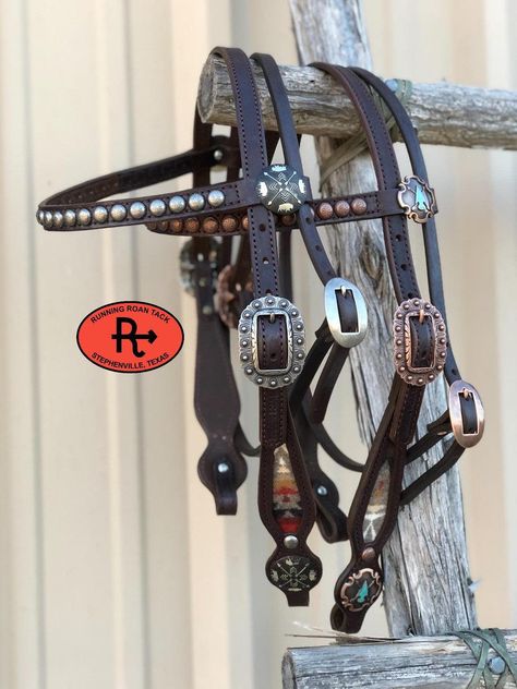 Our "Brazos" style headstall with a browband and throatlatch for added stability. The "Brazos" headstalls have elegant curves that will accentuate a horse's face nicely, with flared cheeks that give us space for decorations. This headstall features inlaid genuine "Pacific Crest" Pendleton® wool. The buckles are riveted on for safety. This headstall is made with our signature dark chocolate bridle leather and is lined with durable, sweat resistant oil tan leather. Handmade from scratch in our workshop in rural Stephenville, TX. HARDWARE OPTIONS: Choose the conchos and buckles you'd like from the list above. You can conveniently view photos of all of the conchos/buckles on this page of our website: https://runningroantack.com/pages/buckles-conchos (opens in new tab/window) SIZING INFORMATION Wither Strap, Clear Handbags, Checkbook Covers, Spur Straps, Tack Sets, Wallet Organization, Handbag Straps, Brass Buckle, Leather And Lace