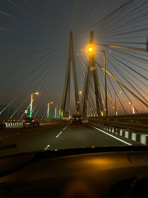 Roadtrip and sunset 🫠 #sunset #skyline #sky #roadtrip Mumbai Flight View, Worli Sea Link Night, Mumbai Snap, Mumbai Aesthetic, Car Songs, Marine Drive Mumbai, Bandra Worli Sea Link, Nightclub Aesthetic, Beach Video