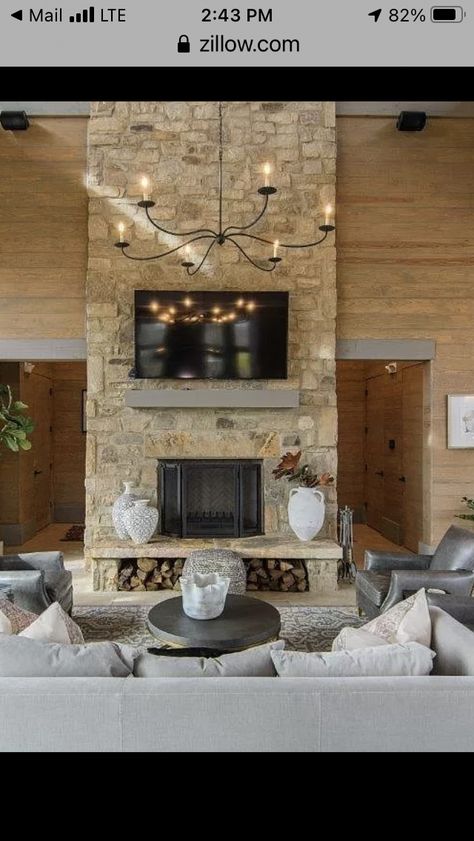 Rock Fireplace With Wood Storage, Wood Burning Stone Fireplaces, Fireplace With Tall Hearth, Mountain Lodge Fireplace, Tall Hearth Fireplace, Wood Storage Under Fireplace Hearth, Wood Storage Under Fireplace, Hearth Wood Storage, Fireplace With Wood Storage Underneath