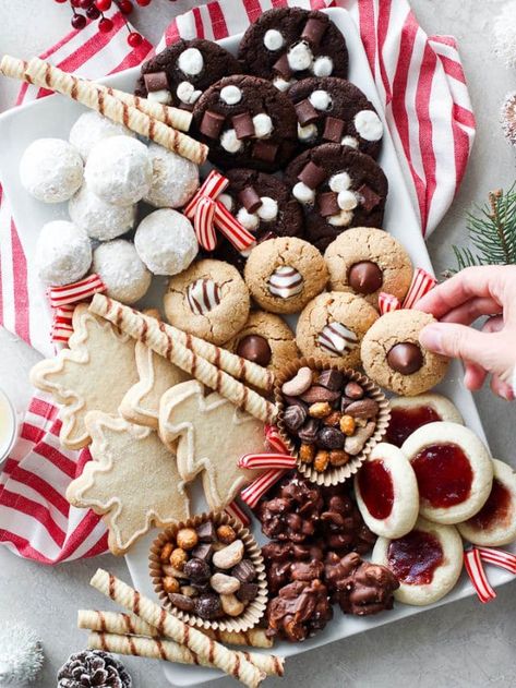 20 Christmas Cookie Recipes - The Real Food Dietitians Christmas Cookie Display Table, Holiday Cookie Platter, Christmas Cookies Display, Christmas Cookie Table Display, Dessert Christmas Party, Christmas Cookie Platter Ideas, Christmas Cookies Photography, Christmas Cookie Charcuterie Board, Christmas Cookie Table