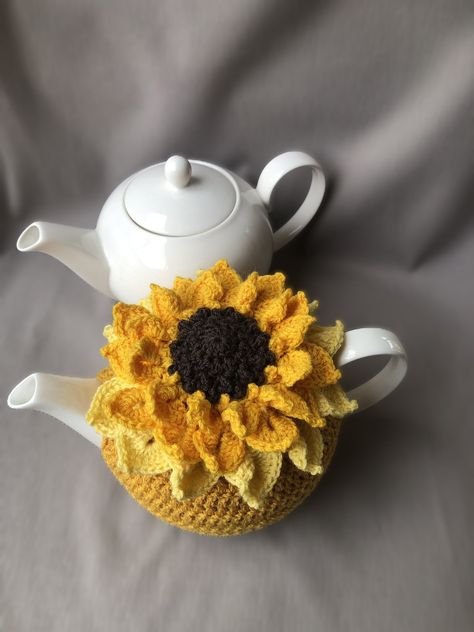 Beautiful Cupcozy Fashion Fall Ideas Crochet Cups Hand Knitted Crochet Flowers Patterns Free Diy Tea Cozy Aesthetic, Teapot Warmer Crochet, Crochet Tea Cosy Free Pattern, Sunflower Items, Crochet Tea Cosy, Sunflower Tea, Cup Cozy Crochet Pattern, Sunflower Aesthetic, Tea Cosy Pattern