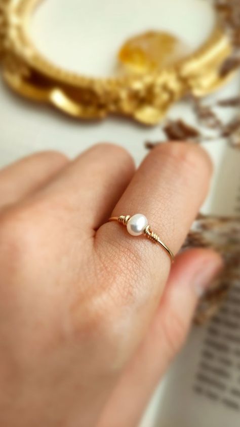 ✨ Tiny Freshwater Pearl Ring with choices of 14K Gold Filled, Rose Gold Filled or 925 Sterling Silver, June Birthstone Gift 💙 Dainty stacking ring with one small pearl. Make a very cute pinky ring. • Pearl Size: 4 mm • Ring Band: 0.8 mm White Pearl Ring, Dainty Rings, Ring Pearl, Freshwater Pearl Ring, Birthstone Gifts, June Birthstone, Pinky Ring, Minimalist Rings, Ring Dainty