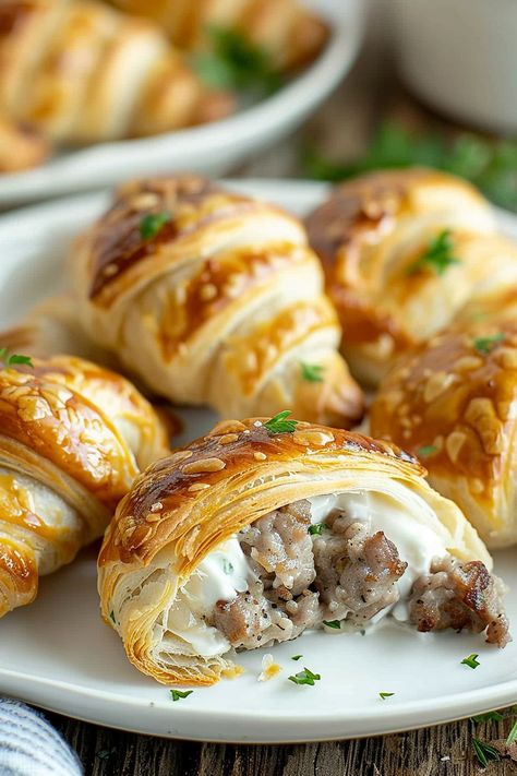 Creamy Sausage-Stuffed Crescent Rolls Croissant Recipes Stuffed, Sausage And Cream Cheese Croissants, Cream Cheese And Sausage Crescent Rolls, Italian Sausage Crescent Rolls, Stuffed Croissant Recipe, Sausage Croissant Rolls, Croissant Recipe Stuffed, Stuffed Crossiant Recipes, Sausage Cream Cheese Crescent Rolls