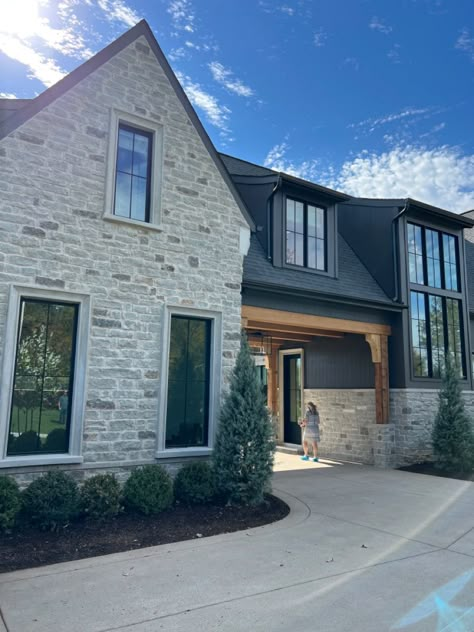 Limestone And Board And Batten Exterior, Tudor House Exterior, Modern Tudor, Board And Batten Exterior, Cottage Woods, Stone Exterior Houses, Exterior Houses, House Garage, Stone Exterior