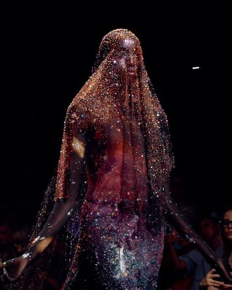 ROBERT WUN• on Instagram: "🪐The Soul Gown  The Closing Look of our FW24 Couture Collection. Consists of 97000 @swarovski crystals embroidery with a total of 1430 hours of hand work. A recreation of the Milky Way through couture craftsmanship, an interpretation of the search for soul within the stars.   Embodied by muse @nyauethriam   #robertwun •" The Soul Robert Wun, Soul Dress Robert Wun, Robert Wun Soul Dress, Robert Wun Soul, Robert Wun 2024, Robert Wun Couture, Swarovski Crystals Dress, Crystal Outfit, Crystal Clothing