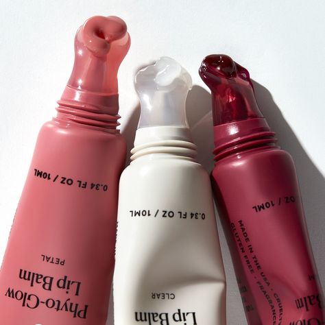 0.34 FL OZ / 10 ML Each Bundle & save with this trio of our most-loved balms on TikTok: Clear, Petal (sheer rosy nude) and Jam (sheer berry). Our intensely nourishing lip balm is formulated with phyto-derived esters, shea, cupuacu butter and plant squalane to cushion lips leaving them feeling silky, soft and smooth. Adds a glowy finish and beneficial moisture. In clear or tinted that adds a sheer wash of color. Note: Our Phyto-Glow Lip Balms contain natural vanilla flavor, which provides a subtl Glow Balm, Cupuacu Butter, Lip Set, Lip Hydration, Lip Balms, Lip Glow, Body Skin Care Routine, Natural Cosmetics, Cute Makeup