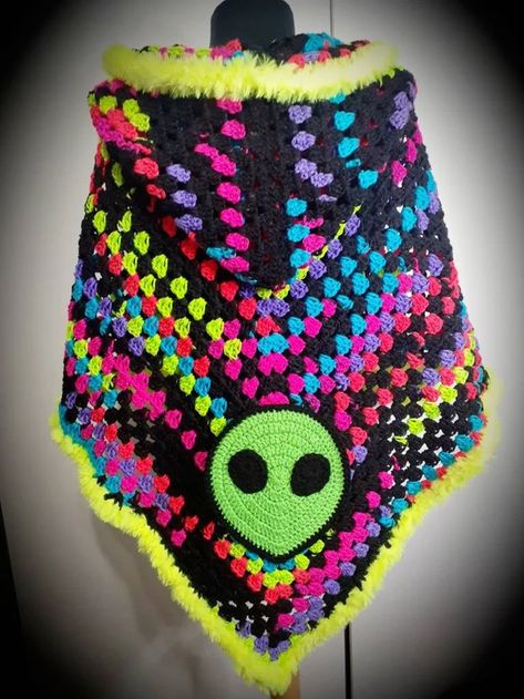 Crochet Hexagon Shawl with Alien Applique #rave #trippy #alien #crochet #hexagoncardigan Rave Crochet Patterns, Blacklight Yarn Crochet Pattern, Alien Crochet Granny Square, Crochet Rave Outfit Pattern Free, Gemini Crochet, Alien Granny Square, Free Crochet Patterns For Stoners, Alien Crochet Top, Trippy Crochet