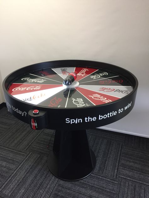 Coca Cola spin to win table for events Alcohol Brand Activation, Point Of Sale Design, Odd Decor, Spinning Display, Coca Cola Marketing, Beer Event, Casino Design, Store Display Design, Football Displays