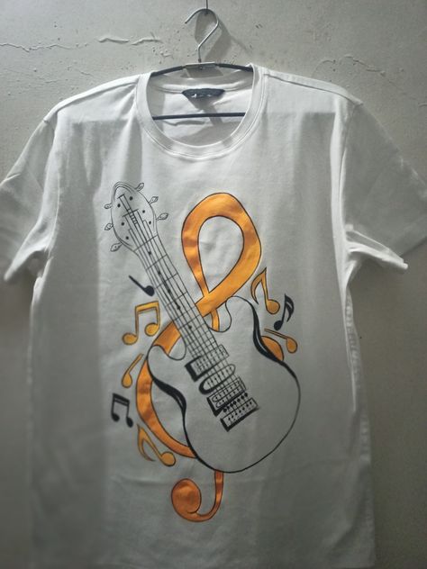 A unique hand paint 🎸 guitar design on boys tshirt Fabric Painting On Mens Shirt, Guitar Tshirt Design Ideas, Hand Painted Tshirts Ideas For Men, T Shirt Painting Ideas Men, T Shirt Painting Ideas Creative, Tshirt Hand Painted, Paint Tshirt, Paint Guitar, Casual Pullover Outfit