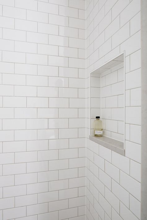 A Serene Bathroom Renovation - white subway tile with light gray grout Subway Tile Shower Niche Ideas, White Subway Tile Niche, Subway Tile White Grout Bathroom, Light Gray Grout White Subway Tile, Shower Niche Ideas Subway Tile, Subway Tiles Shower White, Bathroom White Tile Grey Grout, Subway Tile Gray Grout Bathroom, Subway Tile Around Bathtub