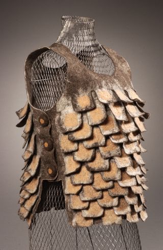 Fiber and Textile, Lisa Klakulak, Artist, Scaled Cuirass, 2005, Merino and Finn/Rambouillet wool fleece, waxed linen; naturally dyed, wet felted, hand stitched, 20" x 16" x 13" (measured on body form), photo: John Lucas Felted Clothes, Body Armour, Felt Fashion, Body Adornment, Body Form, Wet Felt, Textile Fiber Art, Eclectic Art, Nuno Felting