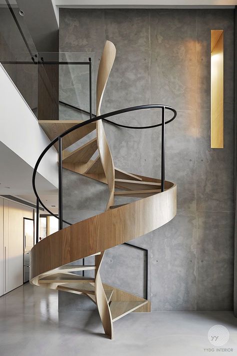 Wooden spiral staircase with a minimalist design Timber Staircase, Escalier Design, Concrete Walls, Modern Stairs, Spiral Stairs, Interior Stairs, Modern Staircase, House Stairs, Spiral Staircase