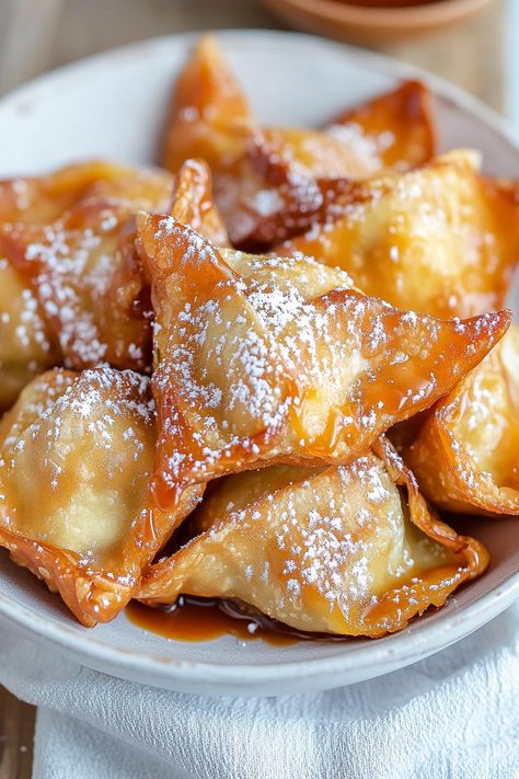 Apple Pie Wontons - An Organized Chaos Apple Pie Wontons Air Fryer, Apple Pie Wantons, Wonton Apple Pies, Dessert Wantons, Sweet Wonton Recipes, Won Ton Recipes Wonton Wrappers, Apple Pie Rangoons, Won Ton Dessert Recipes, Apple Wonton Dessert