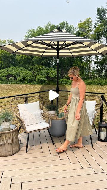 Sarah & Dan | DIY & Design on Instagram: "DIY UMBRELLA STAND TABLE✨ I love a good diy that’s beautiful & functional! We wanted to add seating to this little corner of the deck with an umbrella for shade. We are loving this chair set & umbrella from @walmart they really helped complete this space for a little summer oasis!    #walmartpartner #walmarthome #welcometoyourwalmart #likeit #diyumbrellastand #diypatio #umbrellastand   The chairs are on sale!! // Shop the links for the chairs, planters, umbrella and accessories over on my @shop.ltk - https://liketk.it/4bADv //" Outdoor Parasol Patio Umbrellas, Outside Shade Ideas Patio, Outdoor Umbrella Stand Ideas, Pool Umbrella Holder, Umbrella Stand Side Table Diy, Outdoor Patio Umbrella Ideas, Diy Umbrella Side Table, Outdoor Umbrella Stand Diy, Patio With Umbrella Ideas