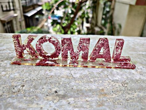 TITLE : Komal DESIGN : This name art is so elegant and beautiful with just pink glitter and resin... love it's simplicity SIZE : 6" x 1.25" x 5 mm thick #MeghnaCreations #komal #elegant #simple #simpleandbeautiful #pink #babypink #pinkresin #pinkglitter #resinname #namestand #personalisedart #nameart #alphabet Resin Art Alphabet, Komal Name Art, Resin Crafts Tutorial, Alphabet Art, Diy Resin Crafts, Diy Resin, Cool Pictures Of Nature, Typography Art, Name Art