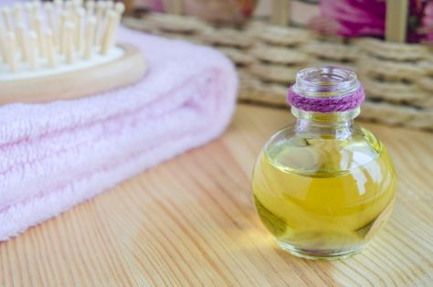 Small bottle of cosmetic oil Natural Stool Softener, Homemade Body Cream, Natural Body Spray, Coconut Oil Body Lotion, Carrier Oils For Skin, Stool Softener, Coconut Oil Skin Care, Coconut Benefits, Coconut Oil For Face