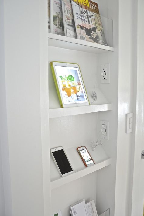 A practical solution for these busy professionals, a charging wall was installed among a magazine rack, making sure that all of the homeowners' necessary devices are as prepared as they are. Kitchen Gadgets Storage, Ikea Picture Ledge, Modern Kitchen Photos, Ikea Boxes, Ikea Ideas, Drop Zone, Ikea Hackers, Kitchen Photos, Ikea Diy