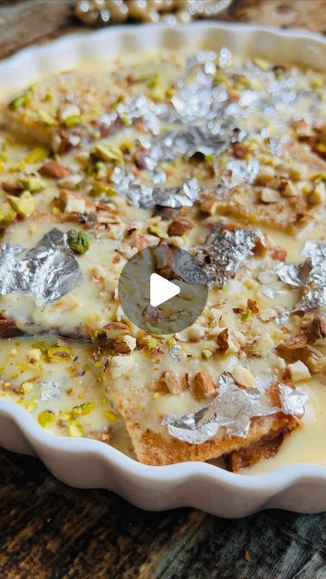 Dr Nadia Aquil | Recipe Developer on Instagram: "Rabdi Shahi Tukda 
Royal bread Dessert 
30 min quick recipe 

Ingredients 

✔️Bread 4 cut into squares 16 square slices 
✔️Ghee 1 cup or oil or butter < ghee is preferred for authentic taste > for deep frying 

🔆In a wok add ghee and fry bread slices until golden Crisp from both sides and set aside 

🔆For Rabdi 

✔️Milk 2 &1/2 cups 
✔️Sugar 1 cup 
✔️Dry milk powder 1 cup @nidoarabia 
✔️Cardamom few pods 
✔️Saffron few strands 
✔️rice flour or corn flour 2 heaped tablespoons dissolved in 1/4 cup of milk @fosterclarksarabia 

Method for rabdi 

✔️In a sauce pan add milk , cardamom, saffron and keep stirring on low to medium flame add sugar and stir for 15 min . 
✔️add corn flour or rice flour mixture slurry and cook until mixture starts to g Shahi Tukda Recipe, Shahi Tukda, Recipe Developer, Cup Of Milk, Fry Bread, Corn Flour, Deep Frying, Sauce Pan, How To Get Thick