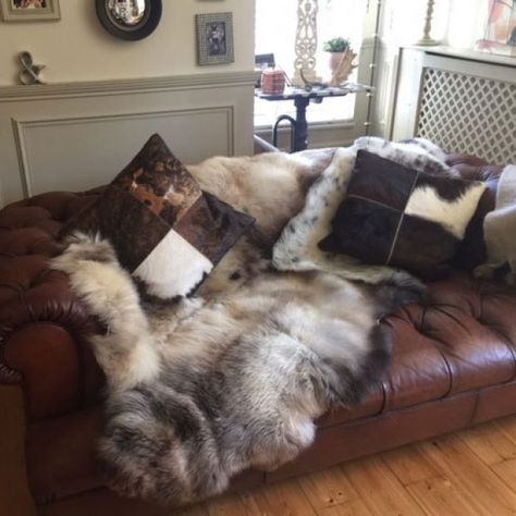 Sheepskins and sofas - the perfect partners Leather Sofa Throws, Sheepskin Rug On Sofa, Leather Sofa Aesthetic, Viking Room, Scandi Style Living Room, Brown Chesterfield Sofa, Danish Living Room, Dark Brown Leather Sofa, House Lounge