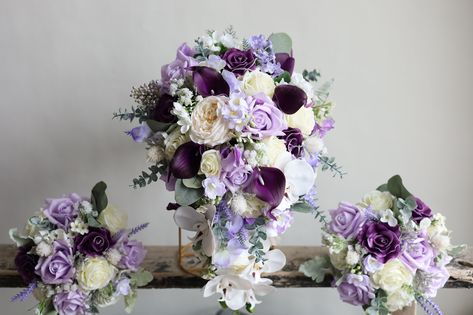 Details& Size The main flowers used are real touch artificial flowers, You will be blown away by the quality. ---------------------------------------------------------- ❤The bridal bouquet, with real touch roses, orchids and lots of purples/lavender/lilac flowers, fillers, greenery.  ---------------------------------------------------------- Ribbon Colors Just as pictured, lilac Or Choose your colors. ---------------------------------------------------------- ❤Matching bouquets, boutonnieres... Purple Flowers Wedding, Bridal Bouquet Purple And White, Brides Bouquet Purple And White, Purple Bridal Bouquet Real Flowers, Plum And Lilac Wedding Bouquet, Purple Bridal Bouquet Budget-bride.shop, Faux Flower Bouquets, Purple Bridal Bouquet, Unique Wedding Receptions