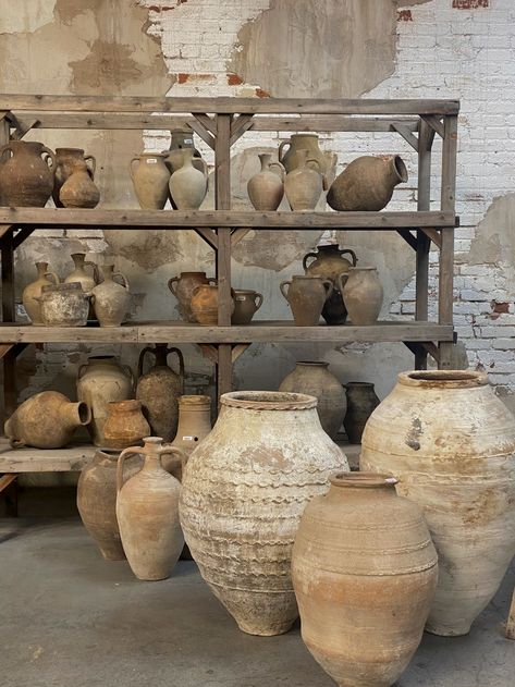 Vintage vessels, vases, pots, tabletop decor, exposed brick walls, olive jars, water jugs, antique vessels. Vintage Terracotta Pots, Olive Oil Packaging, Water Jugs, Old Souls, Wabi Sabi Decor, Olive Jar, Stone Vase, Marble Ceramics, Garden Urns