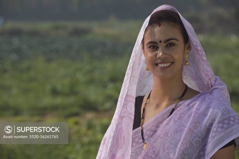 Portrait Of A Woman Standing In An Agricultural Field With Her Head Covered By Saree. Diverse Faces, Portrait Of A Woman, Model Release, Woman Standing, Head Covering, Nun Dress, Stock Photography, Photo Image, A Woman