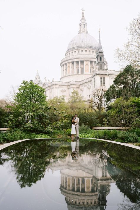 bride and groom by St Pauls Cathedral with refection St Pauls Cathedral London Photography, London Underground Photoshoot, London Portrait Photography, London Pre Wedding Shoot, London Engagement Shoot, London Engagement Photos, London Elopement, St Pauls Cathedral London, London Locations