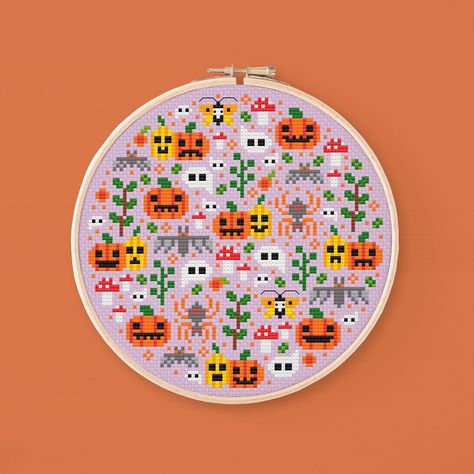 Cross stitch pattern of a cute pumpkin field sprinkled with some moths and mushrooms. This quick and fun project is the perfect wall decor for Halloween and Fall. Grab your needles, take some time for yourself and start stitching this mini project! Check out all the Halloween Garden patterns here! - Halloween Garden: https://www.etsy.com/listing/1555731684 - Witch's Hut: https://www.etsy.com/listing/1555747576 - Victorian Graveyard: https://www.etsy.com/listing/1555743006 - Mini Halloween Garden Ghost Grid Pattern, Mini Halloween Cross Stitch, Moths And Mushrooms, Otgw Cross Stitch, Victorian Graveyard, Cottagecore Cross Stitch, Thanksgiving Cross Stitch Patterns, Disney Halloween Cross Stitch Patterns, Halloween Mini Cross Stitch Patterns