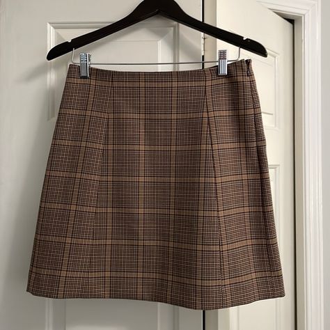 Babaton mini skirt, tan with brown plaid pattern, size 8. Brown Short Skirts, Brown Plaid Mini Skirt, Brown Checkered Skirt Outfit, Winx Faries, Brown Plaid Skirt Outfit, Plad Skirt, Plaid Skirt Brown, Checkered Skirt Outfit, Mini Skirt Aesthetic