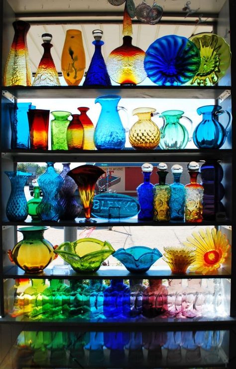 BLENKO GLASS - Located in Milton, West Virginia, the Blenko Glass Company has maintained the tradition of handmade glass for over 100 years. Colored Glass Vases, Blenko Glass, Gorgeous Glass, Glass Decanter, Glass Vases, Glass Company, Bottles And Jars, Vintage Glassware, Glass Shelves