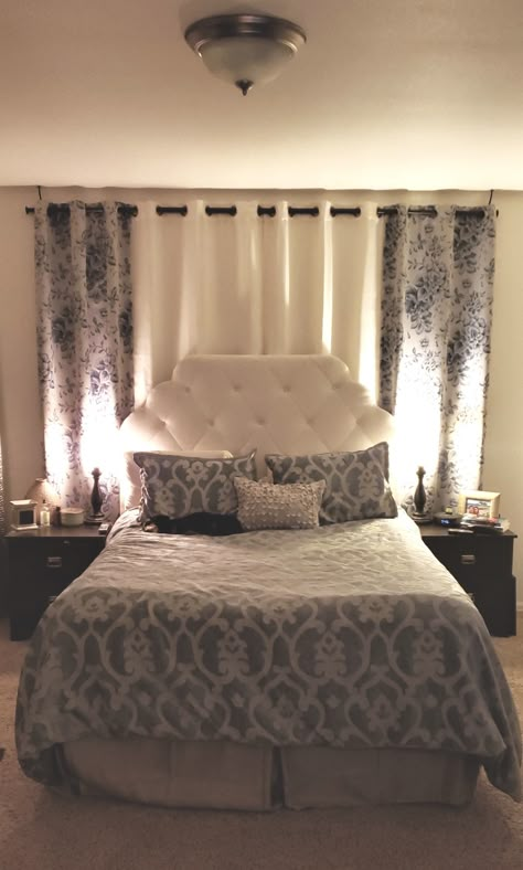 Curtains behind headboard Diy Headboard Ideas With Curtains, Curtain As Headboard, Curtains Behind Headboard Bedroom, Curtain Backdrop Bedroom, King Bed Covering Windows, Bed Behind Curtains, Headboard Curtains Backdrops, Curtains For Headboard Ideas, Window Curtains Behind Bed