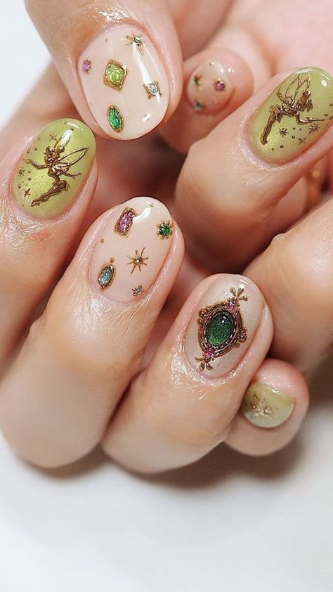 20 Magical Disney-Inspired Fall Nail Ideas You’ll Want to Try Now | Lookosm Peter Pan Nails Disney, Disney Aesthetic Nails, Disney Nail Art Designs, Fairy Nails Designs, Disney Fall Nails, Rapunzel Nails, Tinkerbell Nails, Tangled Nails, Whimsical Nails