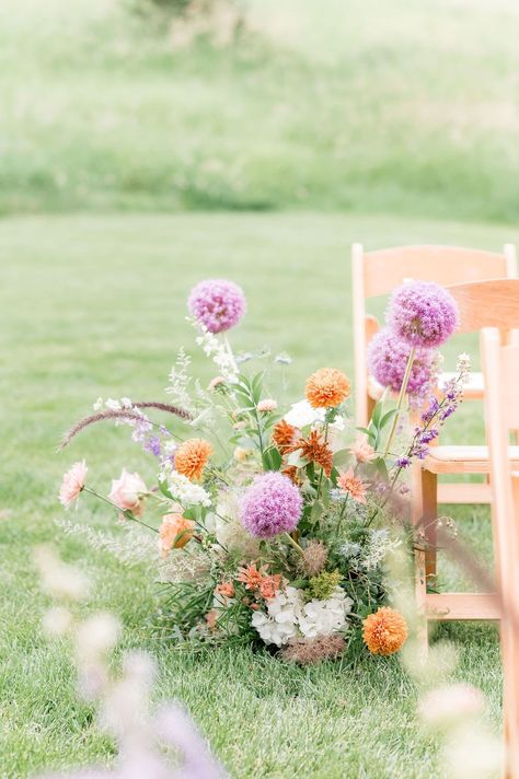 Whimsical aisle meadow pieces from A & A 's summer wedding at Spruce Mountain Ranch in Larkspur, Colorado. Photo @BritniGirard Wedding Florals Whimsical, Wildflower Ceremony Aisle, Wedding Meadow Flowers, Wild Flower Aisle, Meadow Centerpiece, Wildflower Wedding Aisle, Flower Meadow Wedding, Aisle Meadow, Summer Wedding Aisle