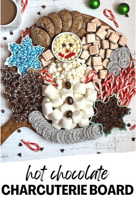 On a cold and snowy night, hot chocolate charcuterie will keep everyone cozy, warm, and satisfied! This dessert board full of sweet treats is designed to serve with hot cocoa - use some of the treats to flavor your mug of cocoa and others as dippers! Serve alongside warm hot chocolate and everyone will love it. Perfect for Christmas Eve, winter parties, New Years, sleepovers, and more! via @Tastyovenlovin Charcuterie Dessert Board, Hot Chocolate Charcuterie Board, Hot Chocolate Charcuterie, Charcuterie Dessert, Chocolate Charcuterie Board, Chocolate Charcuterie, Christmas Dessert Table, Dessert Board, Mini Candy Canes